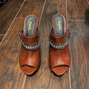 Brown platform clogs